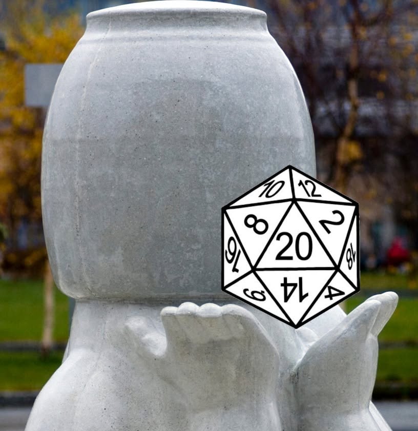 Statue with a die hovering in their hand